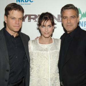 George Clooney, Matt Damon and Amanda Peet at event of Syriana (2005)