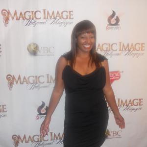 Nicole Denise Hodges posing on red carpet on Confidential in Beverly Hills CA