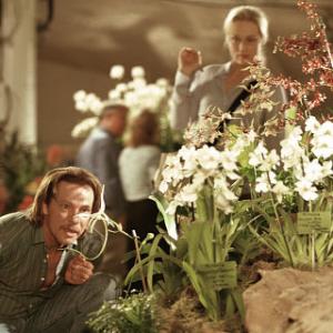 John Laroche Chris Cooper tries to help journalist Susan Orlean Meryl Streep understand the true beauty of the orchid species