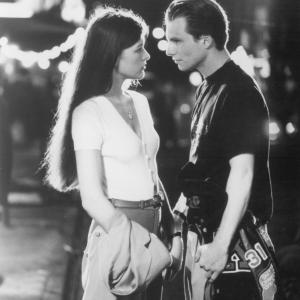 Still of Milla Jovovich and Christian Slater in Kuffs 1992