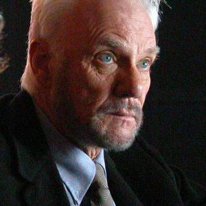 Still of Malcolm McDowell in Red Roses and Petrol 2003