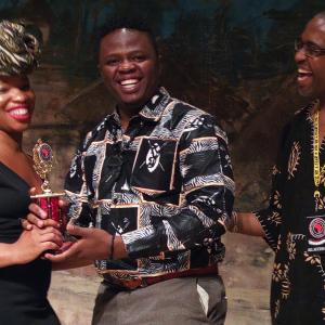 Timoth Conrady receiving the trophy from Silicon Valley African Film Festival 2015