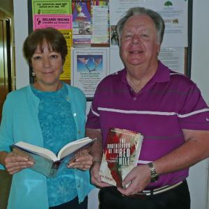 Dan presenting an archive copy of his book to Margaret Mohundro, Executive Director of the Sanibel Library
