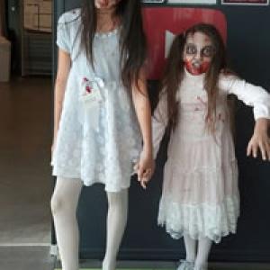 Emily on set of a zombie movie with her sister Gracie.
