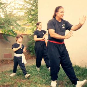Tujunga backyard of Buddha Z with kids Both kids could perform the entire Yang Tai Chi Short Form before they were in Kindergarten This Tai Chi movie is called Playing the Pipa I play the Chinese Pipa on the Tai Chi Magic 1 album