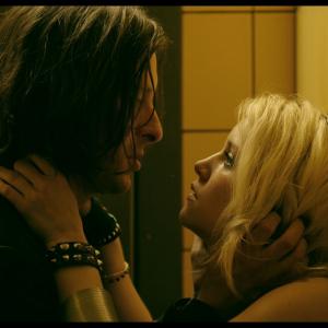 Still of Carl Barât and Audrey Bastien in For This Is My Body (2015)