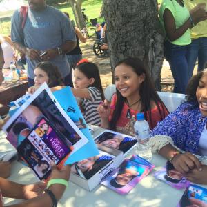 Shea having a blast signing autographs at the 2015 Walk for Kids Growth red carpet and celeb meet and great Shea sitting next to Bryanna Yde and Laya Hayes and Joelle Better