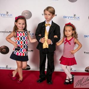 Shea Taylor with her sister Sofie Taylor and Calos Cluff at the red carpet premire of Gold Fools