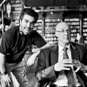 Academy Award-nominated Joe Berlinger (left) with former Secretary of the Treasury Henry Paulson (right) on the set of 