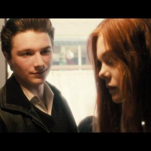 Still of Rory Finn (as Rory James) and Elle Fanning in 'Ginger and Rosa'