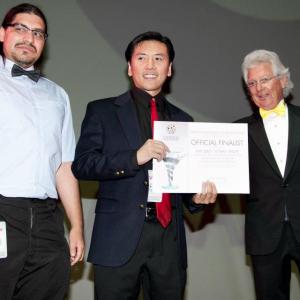Cal Nguyen receiving the 2012 Las Vegas Film Festival Official Finalist award in the TV Pilots Competition in Las Vegas NV July 22 2012
