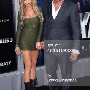 Randy Couture and girlfriend Mindy Robinson attend the premiere of The Expendables 3 in Hollywood