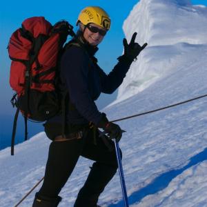 War Reporter Alex Quade climbing Mt. Rainier with wounded Special Operators, before redeploying to Iraq. 2008.