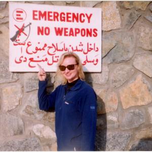 War Reporter Alex Quade for CNN outside the ER hospital in Kabul Afghanistan 2002 No weapons no AK47s allowed inside