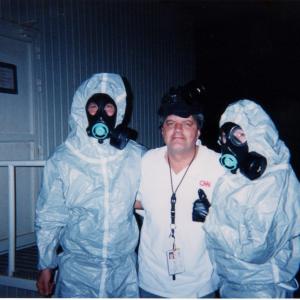 War Reporter Alex Quade for CNN on right in full NBCgear nuclear biological chemical during the Shock  Awe campaign CNNs Gary Tuchman left cameraman Damir Loretic in middle