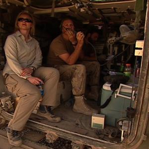 War Reporter Alex Quade with Canadian Special Forces JTAC and USAir Force Spec Ops Combat Controllers as they call in air strikes Sper Wan Gar Afghanistan