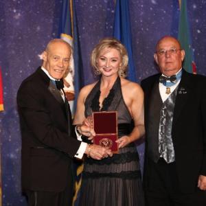 War Reporter Alex Quade receives Medal of Honor Societys Tex McCrary Award For Excellence In Journalism at packed Reagan Presidential Library 2009 MOH recipient Special Forces ColRobert LHoward left MOH recipient Ranger CSM Gary Littrell right