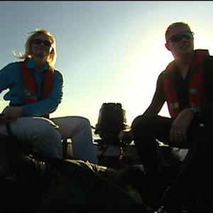 War Reporter Alex Quade in zodiac raft with elite Pararescuediver for her Combat Search  Rescue series for CNN