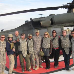 War Reporter Alex Quade hitchhikes to remote firebases and combat outposts with USO Tour including awardwinning comedian Louis CK and country singer and Black Hawk Down Ranger Keni Thomas Iraq and Afghanistan 2008  2009