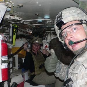 War Reporter Alex Quade inside Stryker vehicle on patrol with Cavalry unit Iraq 2008