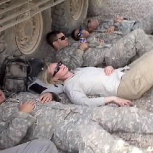 War Reporter Alex Quade catches a rest between combat missions with US Army in Iraq Quade uses body armor as pillow 2007