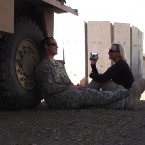 War Reporter Alex Quade interviews Special Forces Soldier between missions in Iraq. 2008.