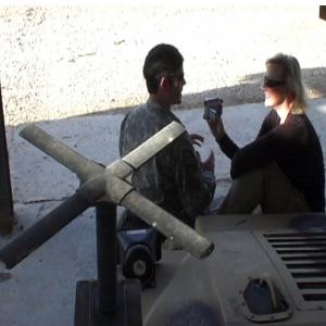 War Reporter Alex Quade interviewing Green Beret in Iraq. 2008.