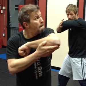 Aaron Eckhart Ron Balicki and Alex Jovica training for the movie I Frankenstein