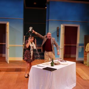 Amanda Spinella as audience plant Christine Patterson and Neil A. Casey as Francis Henshall in The Lyric Stage Company of Boston's One Man, Two Guvnors (2013)