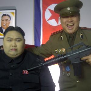 As a North Korean general with Kim JungUn lookalike in a comedy
