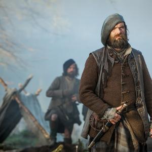 Still of Stephen Walters and Duncan Lacroix in Outlander 2014