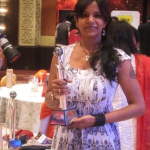 Holding an award at the CNNIndia annual ceremony