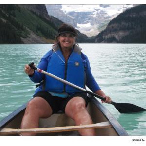 Actress Brenda Moss-Clifton canoeing on Lake Louise, Alberta, Canada