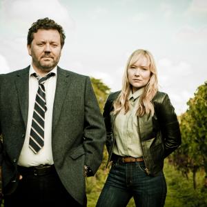 Still of Neill Rea and Fern Sutherland in The Brokenwood Mysteries (2014)
