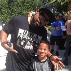 Sage and Ice Cube on set.
