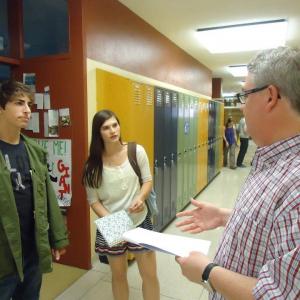 Receiving notes from writer Kevin Dilmore with Mitchell McCroskey and Andrea Fantauzzi while onset for Make Up Work