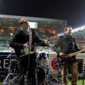 Andy (first left) with his band The BibleCodeSundays on the pitch at Celtic Park, Glasgow for the Celtic V Barcelona Champions League game - Celtic won 2-1
