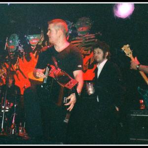Andy when he played with Shane MacGowan and The Popes  The Mean Fiddler London 1999