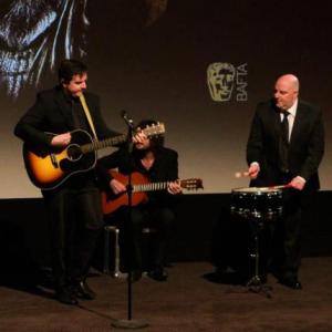 Andy (far right) and his band The BibleCodeSundays perform at the BAFTA Premiere of his short film Tax City