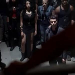 Still of me on set of the CWs The Originals Season 1 Episode 7 Im on the right side of the picture wearing a black tank top with a chain around my neck
