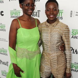 Actress Lupita Nyongo R and Dorothy Nyongo attend the 2014 Film Independent Spirit Awards at Santa Monica Beach on March 1 2014 in Santa Monica California
