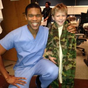 Gaius Charles as Dr Ross and Cole Michaels as Kevin Platt on Greys