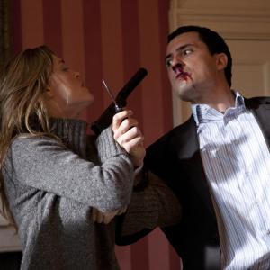 Still of Melissa George and Dhaffer L'Abidine in Hunted (2012)