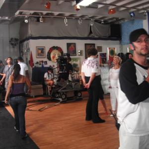 Studio set in Tony Tango, actor Max Maullion appearing at center. 2010