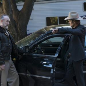 Still of Jim Beaver and Timothy Olyphant in Justified 2010