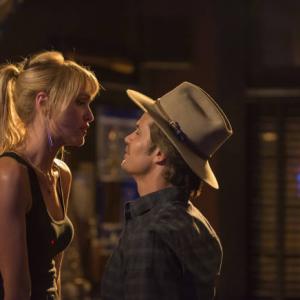 Still of Timothy Olyphant and Jenn Lyon in Justified 2010