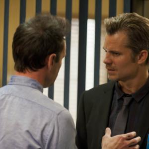 Still of Walton Goggins and Timothy Olyphant in Justified 2010
