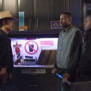 Still of Steve Harris Wood Harris and Timothy Olyphant in Justified 2010