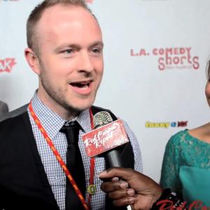 Greg and Jess Bro on the red carpet at the LA Comedy Shorts Film Festival in 2013