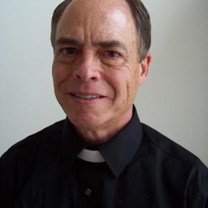 Dave Bresnahan as a Catholic priest in the film 